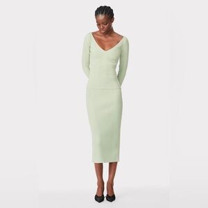 Hervé Leger matching skirt and top . Stretchy. More like a L/XL.